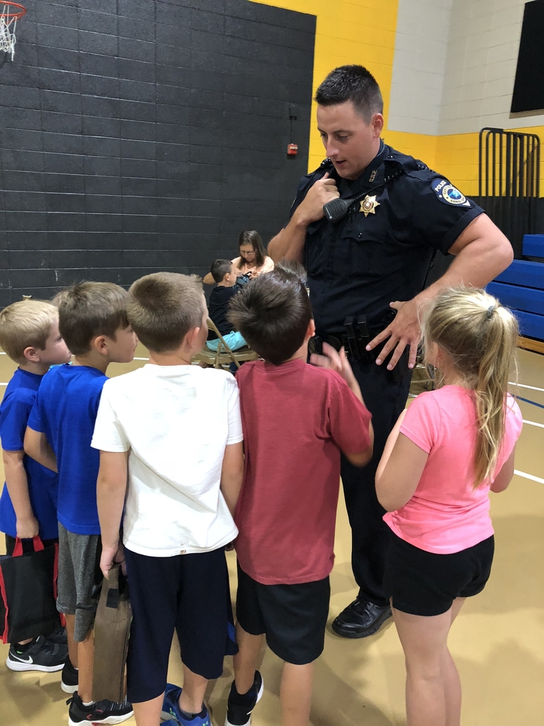 Officer Barnett visiting students at Angus.