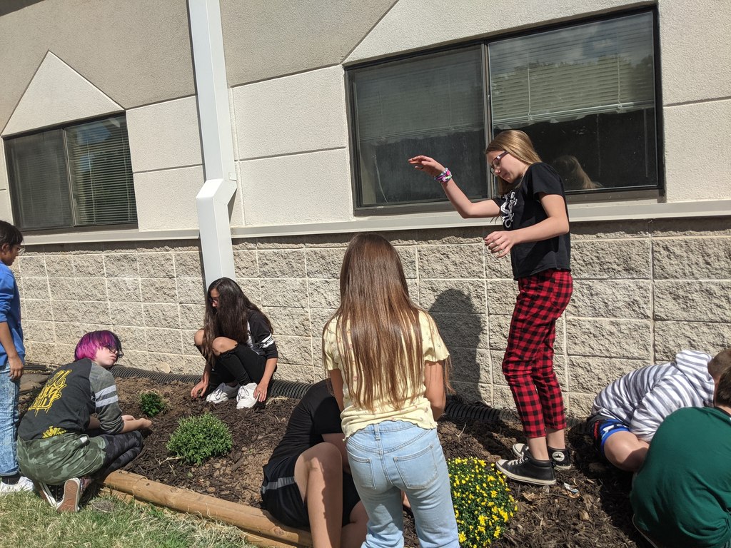 GRIT classes planting mums
